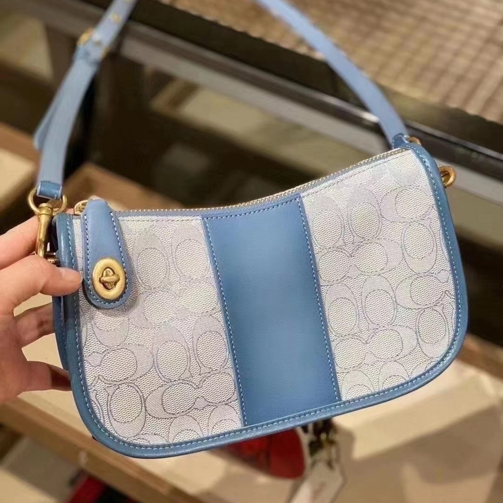 Coach Swinger Signature Blue and Cream Shoulder Bag